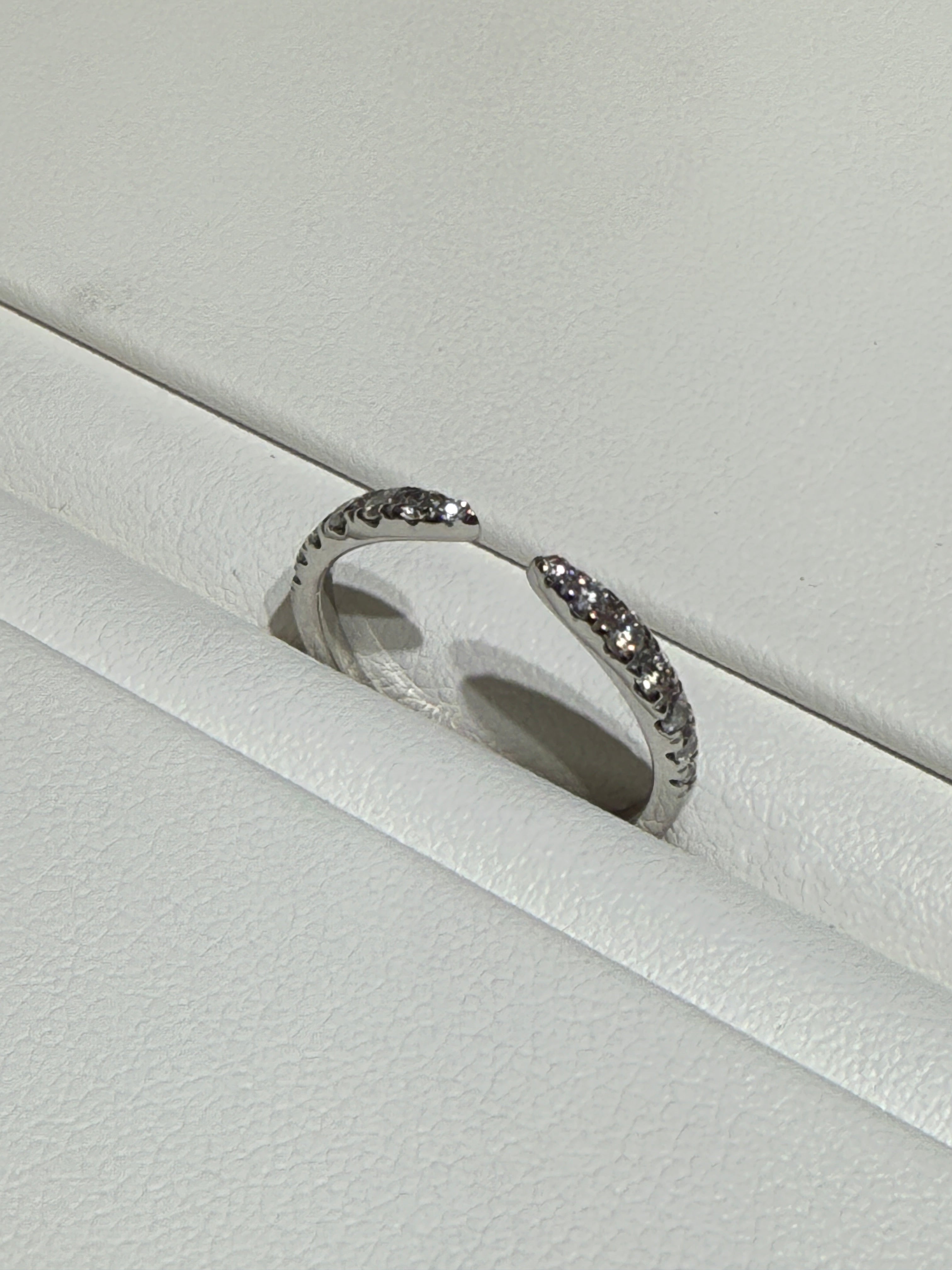 14K White gold diamond wedding band.