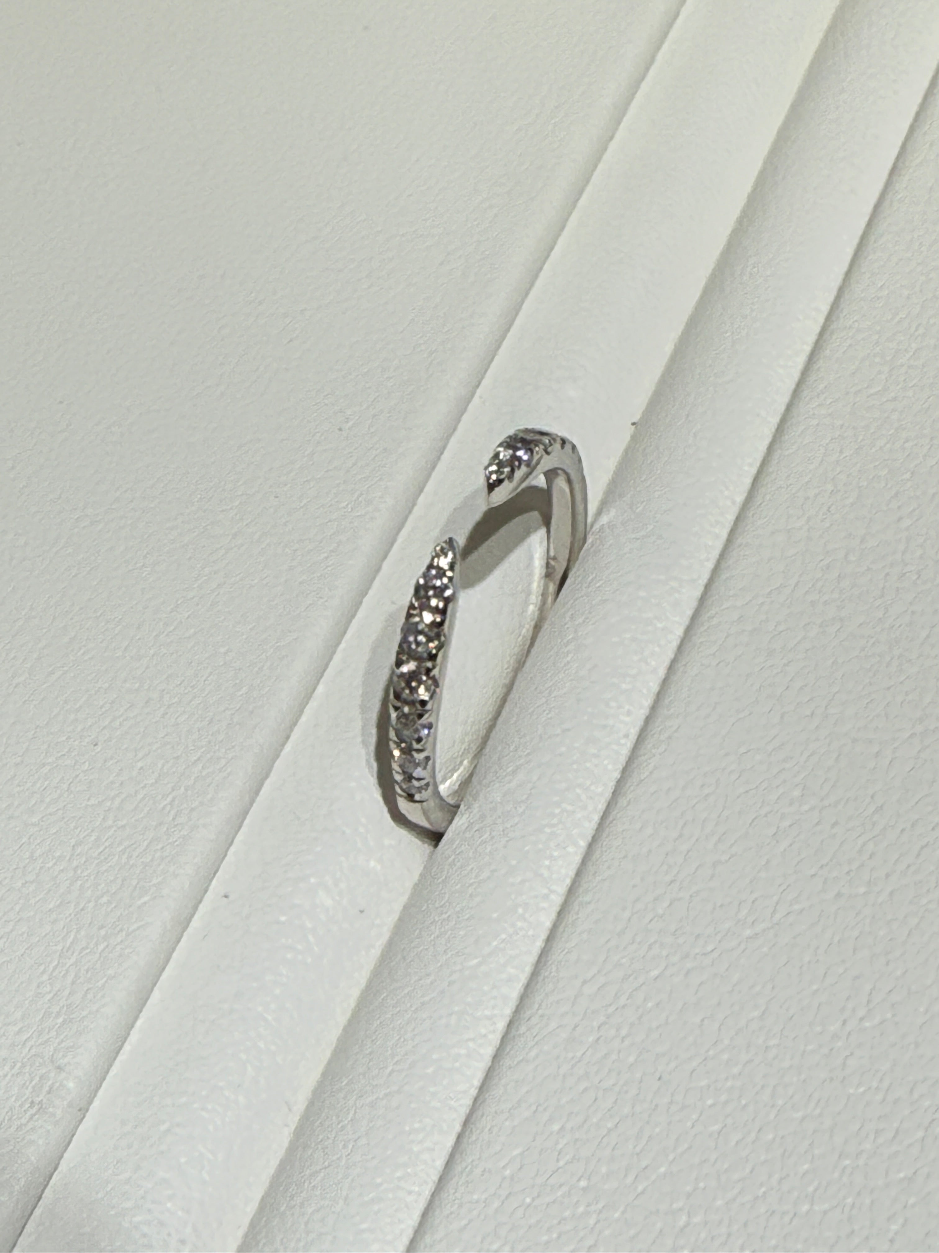 14K White gold diamond wedding band.
